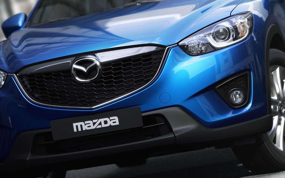 Mazda developed a special resin aimed at reducing the weight of parts of its vehicles picture #1