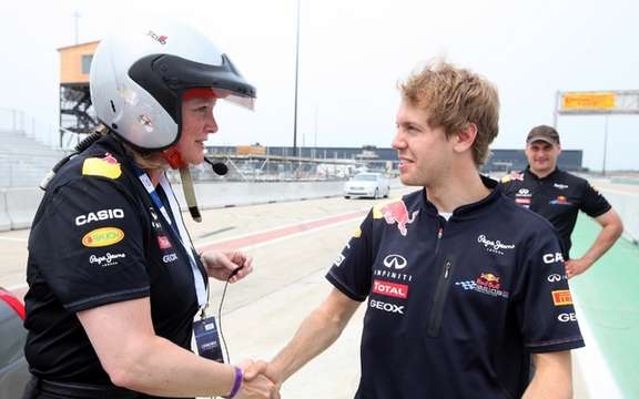 The world champion Formula 1 Sebastian Vettel puts to the test Wendy Duward