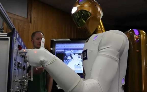 The humanoid Robonaut 2 GM takes its place at the International Space Station
